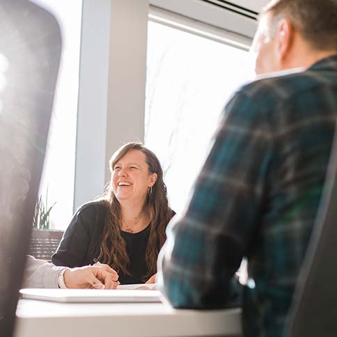Professionals collaborating in a conference room.