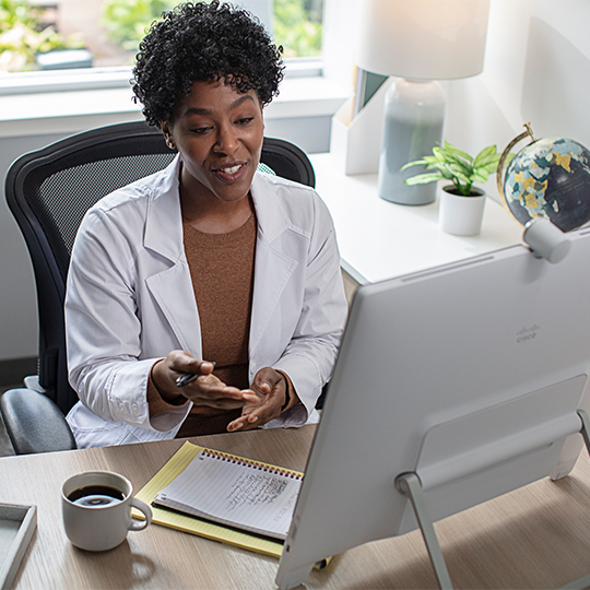 Professional speaking to computer monitor